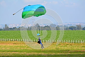 Woman parachute landing