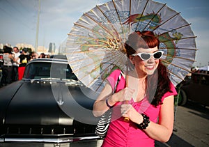 Woman with parasol in 1950's style