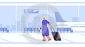 woman passenger with baggage walking at modern airport terminal waiting hall departure lounge interior traveling concept