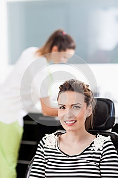 Woman patient at the dentist waiting to be checked up