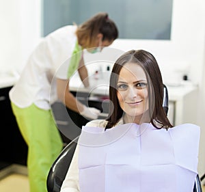 Woman patient at the dentist waiting to be checked up