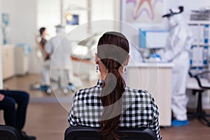 Woman patient in dentistiry office waiting for diagnosis