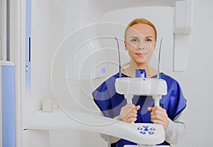 Woman patient doing panoramic teeth x-ray