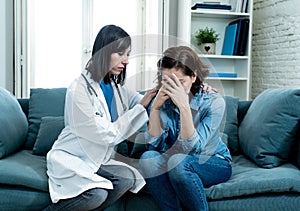 Woman patient receiving bad news. Friendly Doctor comforting and support sad patient with empathy