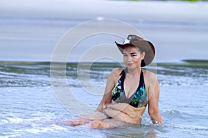 Woman pattern bikini relax on beach