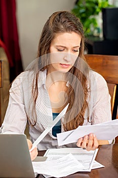 Woman paying bills