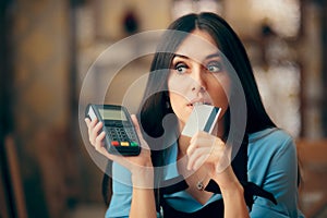 Woman Paying with Credit Card by Paying POS Terminal