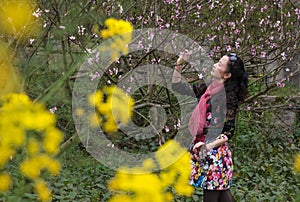 Woman in peach garden