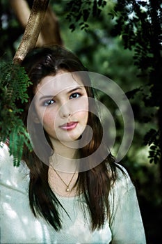 Woman with Pendant in Deep Woods