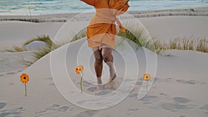 Woman performer dancing seashore at summer twilight. Girl moving beautifully.