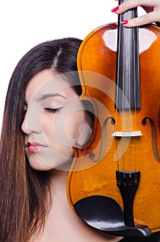 Woman performer playing violin on white