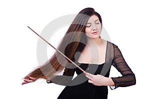 Woman performer playing violin on white