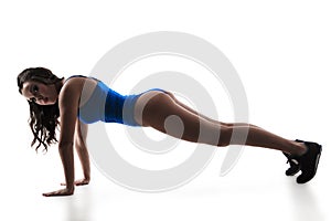 Woman performing push-ups exercise