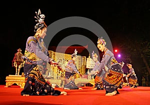 Woman performs a Thai traditional dance