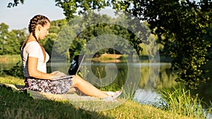 Woman person business nature outside with online technology. Computer outdoor. Student girl working on laptop, tablet in