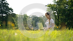 Woman person business nature outside with online technology. Computer outdoor. Student girl working on laptop, tablet in