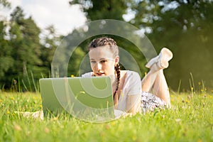 Woman person business nature outside with online technology. Computer outdoor. Student girl working on laptop, tablet in