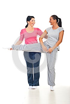Woman with personal trainer laughing