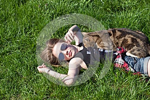 Woman petting cat in the garden