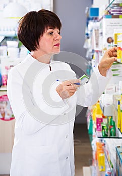 Woman pharmacist in pharmacy