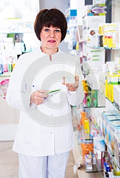 Woman pharmacist in pharmacy