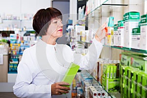 Woman pharmacist in pharmacy