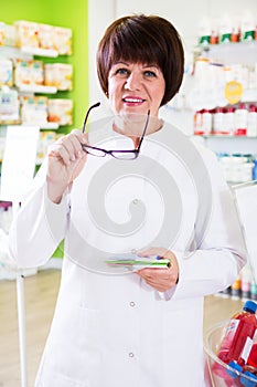 Woman pharmacist in pharmacy