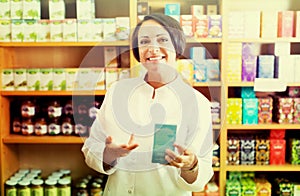 Woman pharmacist in store