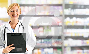 Woman pharmacist working at pharmacy.