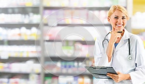 Woman pharmacist working at pharmacy.