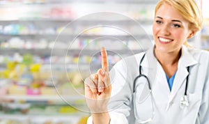 Woman pharmacist working at pharmacy.