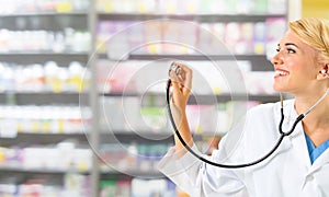 Woman pharmacist working at pharmacy.