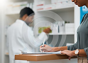 Woman at pharmacy, clipboard and medical insurance information at counter for script for prescription medicine