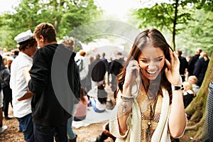 Woman, phone call and loud music festival for communication, conversation or networking in nature. Female person