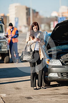 Woman on the phone after car crash