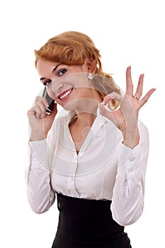 Woman with phone and ok gesture