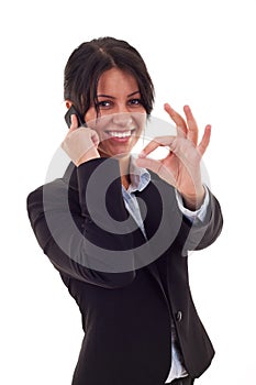 Woman with phone and ok sign