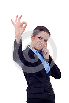 Woman with phone and ok sign