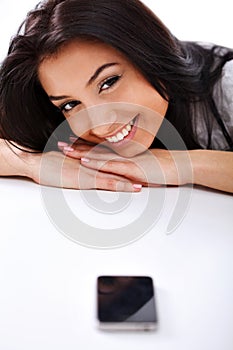 Woman with phone smiling