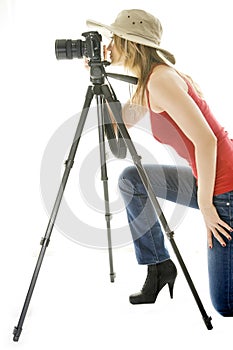 Woman with photo camera and tripod