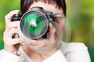 Woman photographer with camera