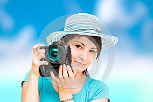 Woman photographer with camera