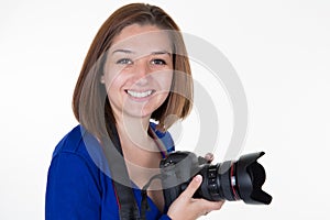 Woman photographer holding reflex camera dslr smiling