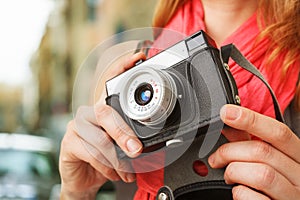 Woman photographer with lomo camera.