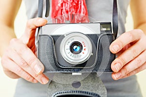 Woman photographer with lomo camera.