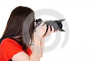 Woman photographer profile side with professional photo camera on white background with copy space