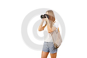 Woman photographer is taking images with camera isolated on white.