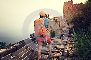 Woman photographer taking photo on great wall