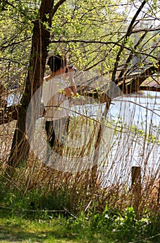 Woman photographing nature, springtime