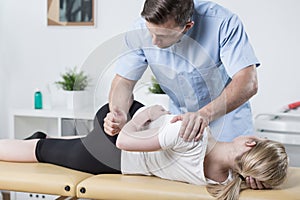 Woman on physiotherapy table